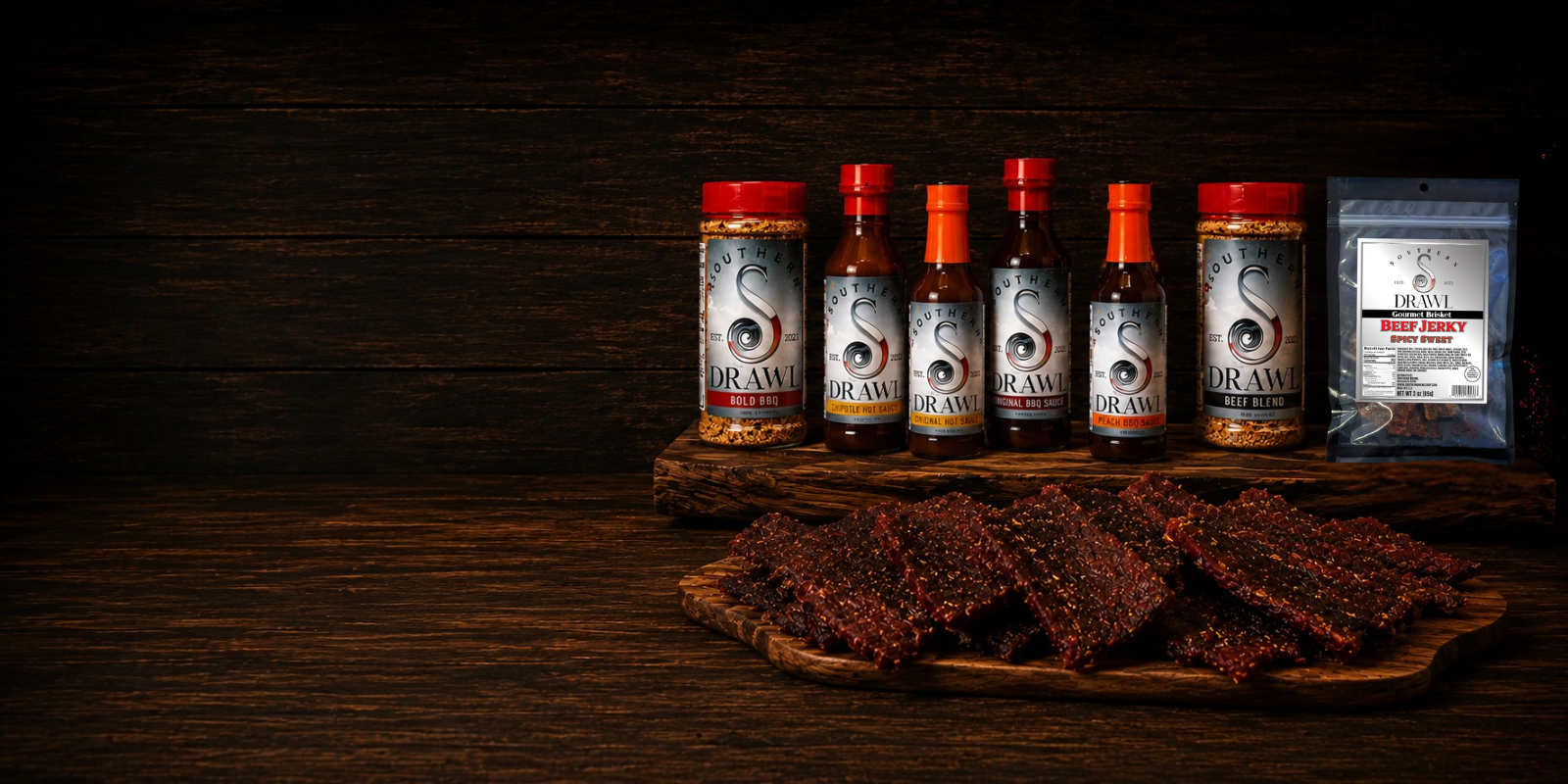 A set of six RAWAY brand hot sauce bottles with red caps and a black pouch of seasoning, arranged on a rustic wooden board alongside several pieces of seasoned jerky on a dark wood background.